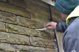 Lime mortar being applied